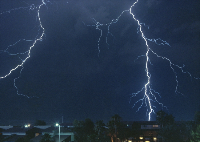 Lightning bolts striking the city